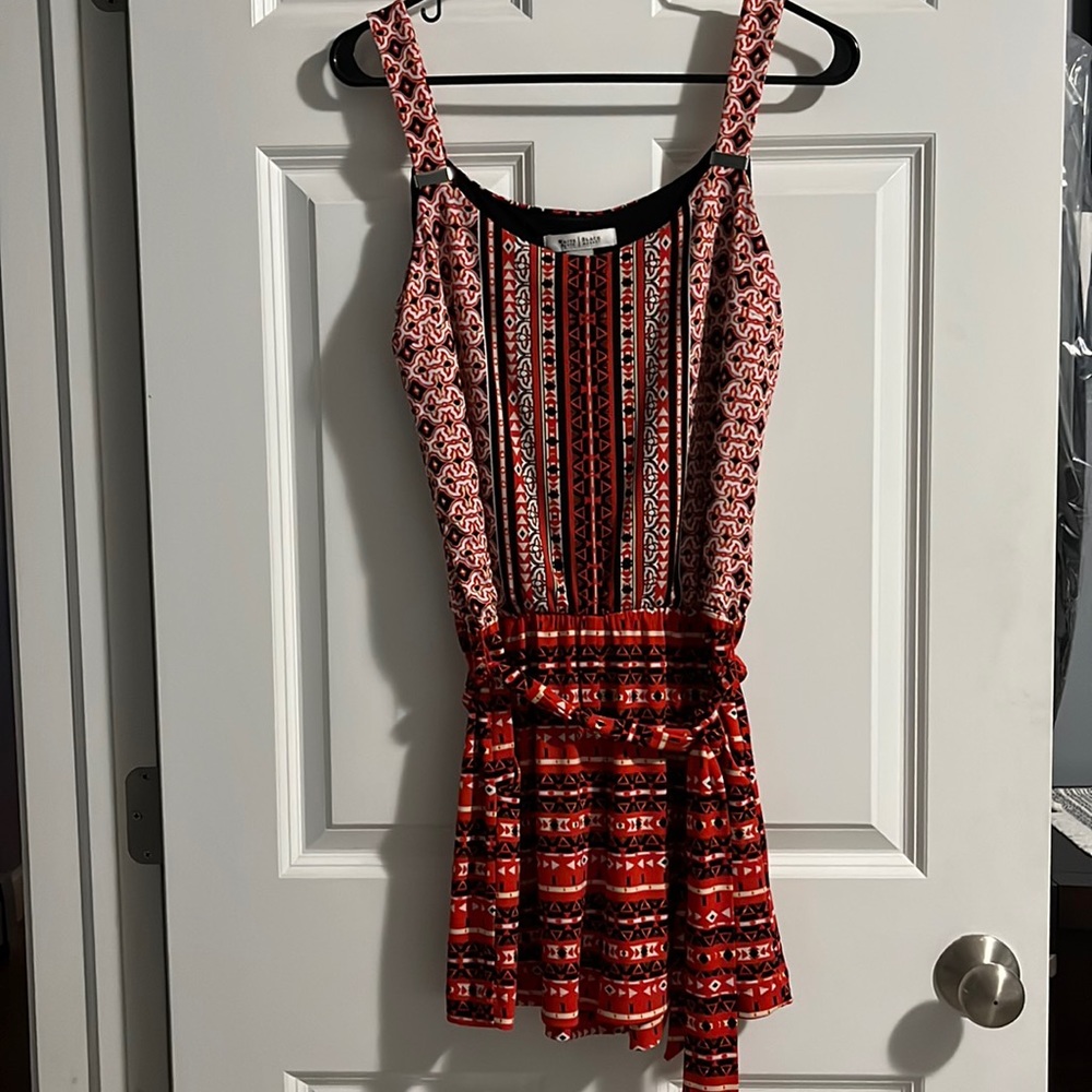 White House Black Market romper in black, white and red. EUC